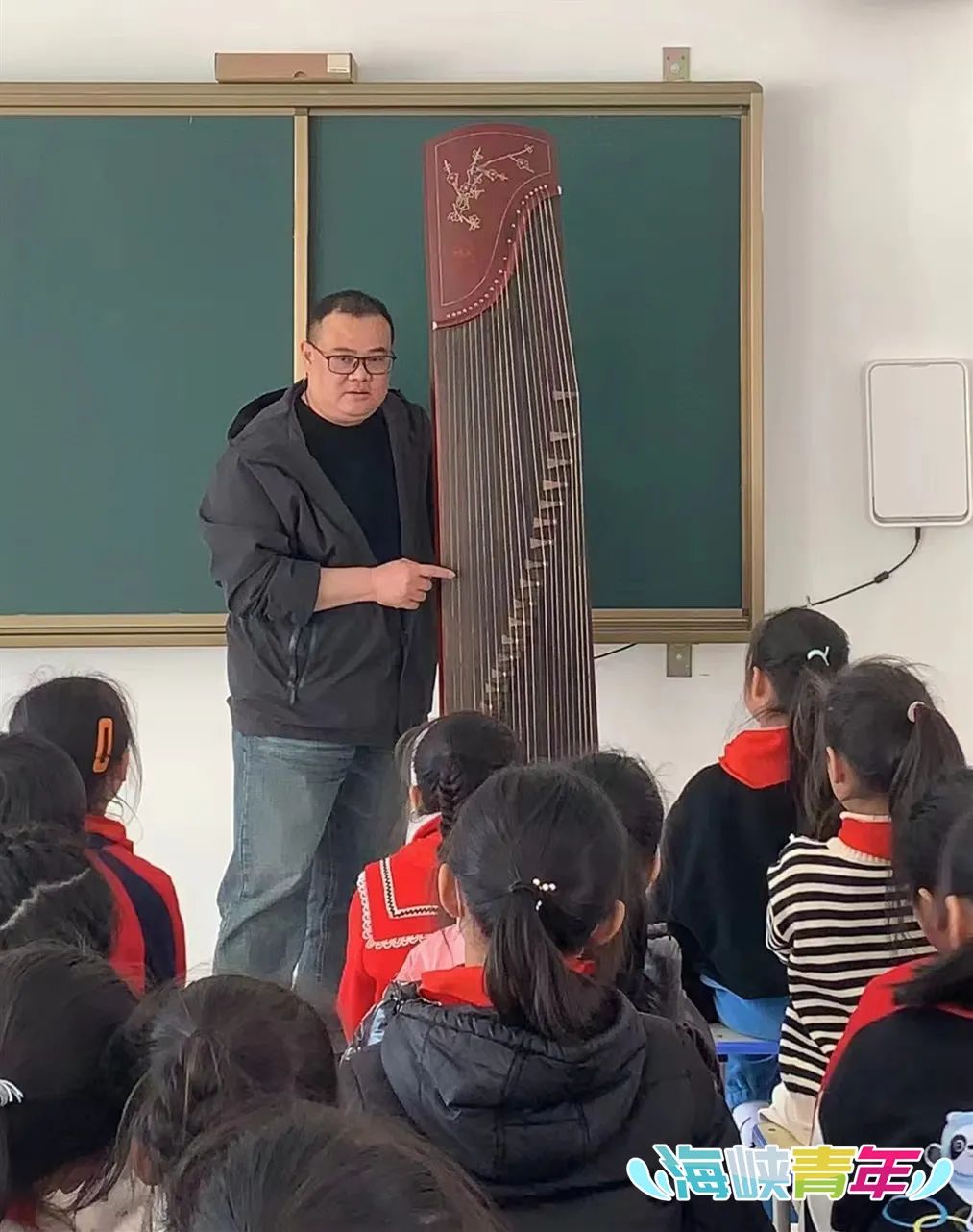 在榕台胞谭家明推动民乐进校园